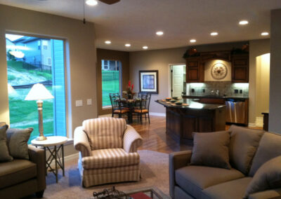 Furnished ranch home family room, kitchen, and dinette built by an Omaha Home Builder.