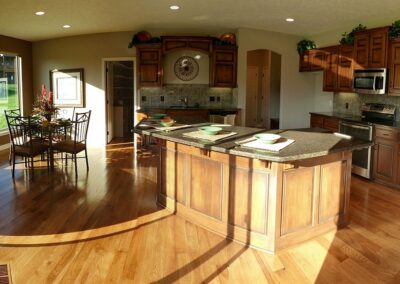 Large kitchen with large island and natural lighting.
