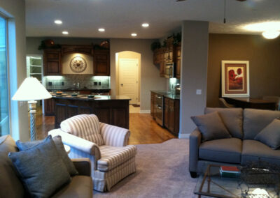 New home family room and kitchen by Aurora Homes Omaha