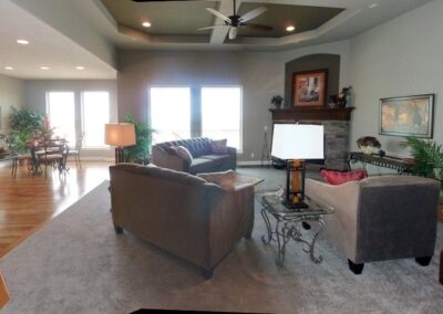 Furnished family room, kitchen, and dinette by reputable home builder in Omaha, NE.