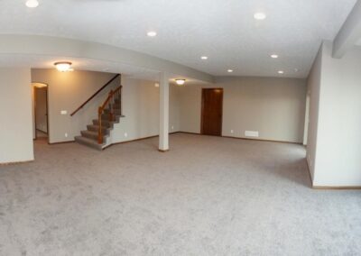 Finished basement flex area with bright walk out windows.