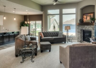 Bright family room with huge windows in Omaha, NE.