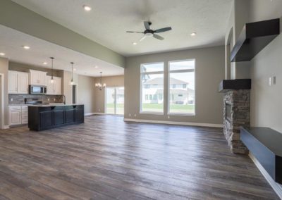 Open concept great room, kitchen and dinette by Aurora Homes Omaha, NE.