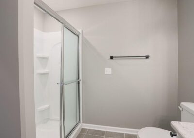 Finished Basement Bathroom with grey accents.