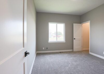 Bedroom with walk in closet in Papillion.