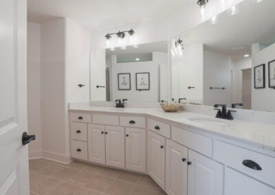 bright bathroom with 2 sinks and modern décor in Papillion, NE