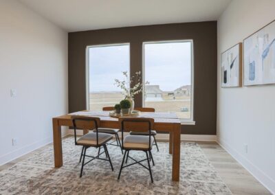 bright dinette with large windows and wood table in Omaha, NE