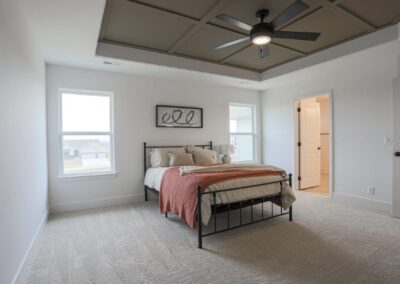well lit bedroom by Omaha home builder Aurora Homes