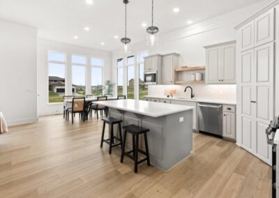 Large Kitchen Island by Home Builder Aurora Homes in Elkhorn NE